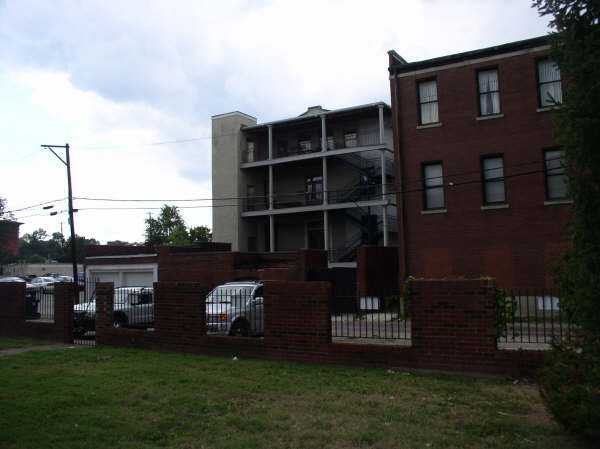 parkingbehindbricksecuritywall.jpg